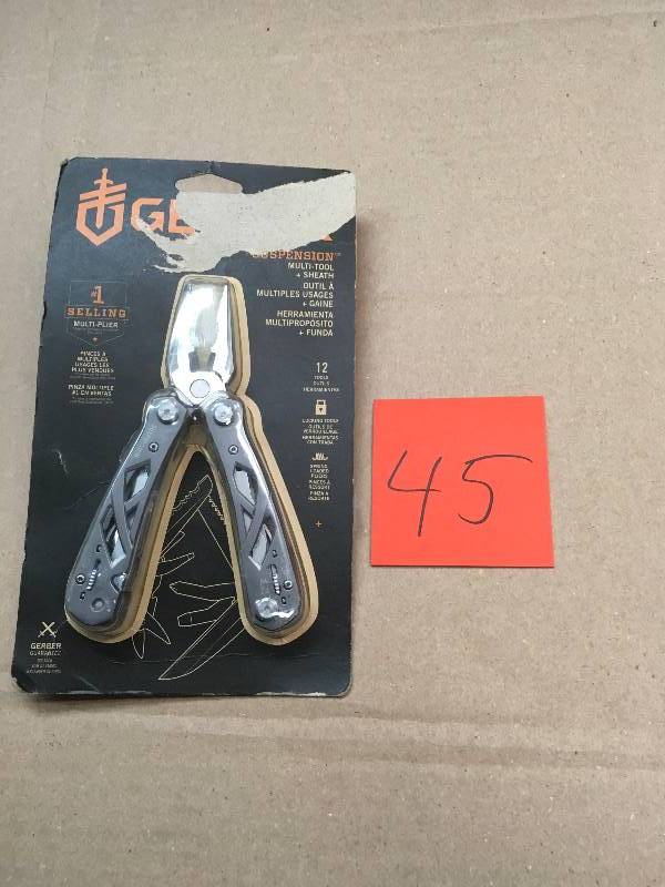 lot 45 image: Gerber Suspension Multi-tool & Sheath - Black 12-tool in good condition