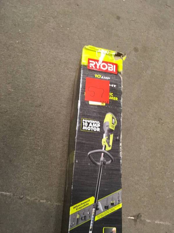 lot 57 image: RYOBI 18 in. 10 Amp Electric String Trimmer in good condition