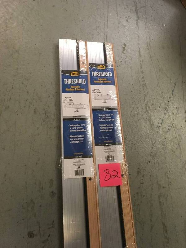 lot 82 image: M-D Building Products 4-916 in. x 36 in. Satin Aluminum and Oak Adjustable Threshold not used