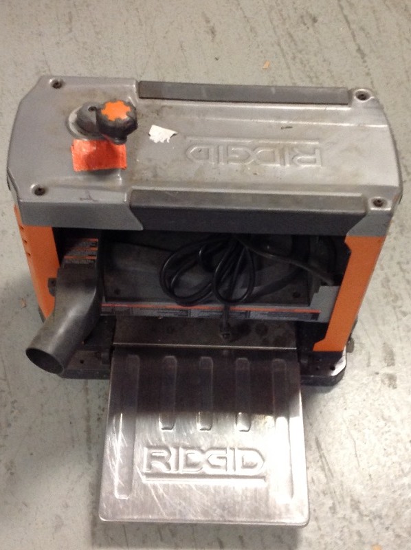 lot 109 image: RIDGID 13 in. Thickness Corded Planer used in working conditions