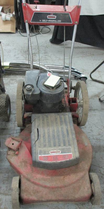 lot 6 image: Craftsman 22 Cut Self Propelled Mower could use a muffler