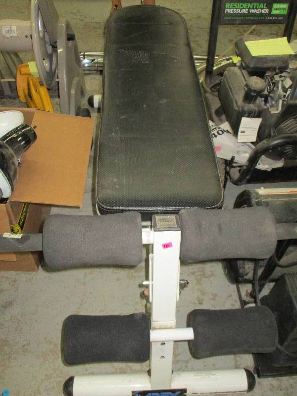 lot 10 image: Exercise bench to do situps on it does adjust and sit up in sitting position to lift weights