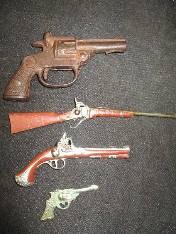 lot 111 image: Some Old Toy Guns