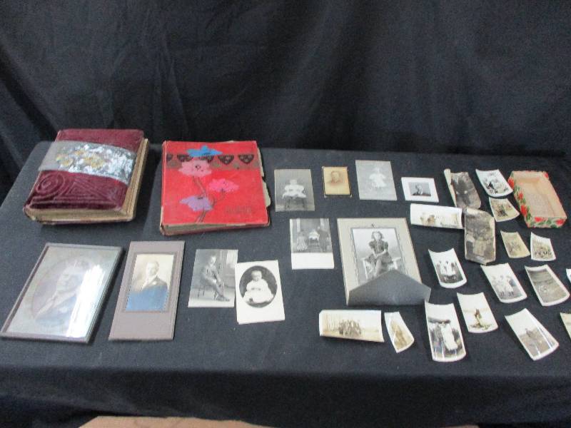 lot 117 image: Old photo album with old black and white pictures