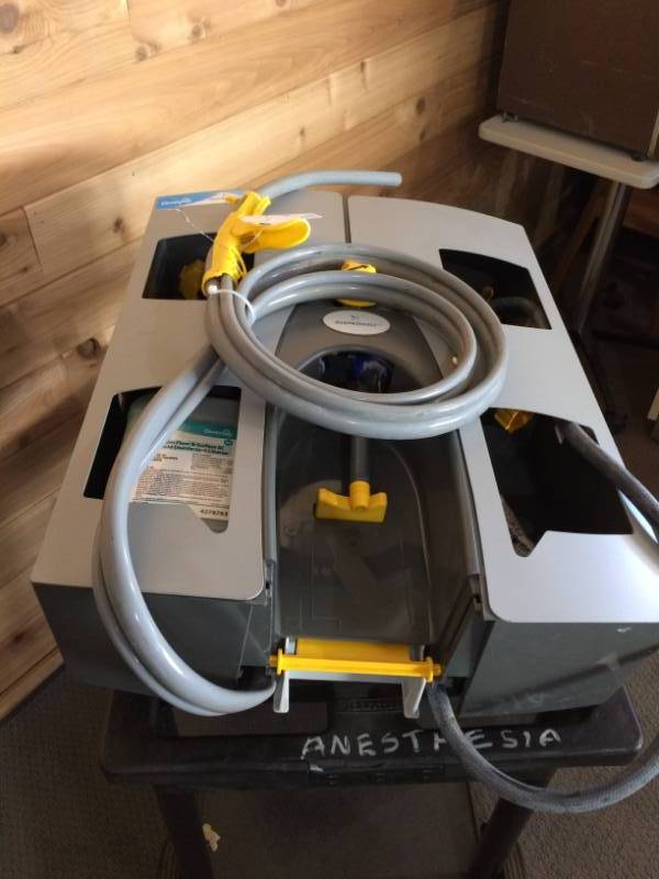 lot 6 image: MSRP $500 DIVERSEY Wall Mount QuatroSelect Chemical Mixing Dispenser, Number of Chemicals Dispensed - 4 Great Working Condition - See Youtube For Set Up Instructions