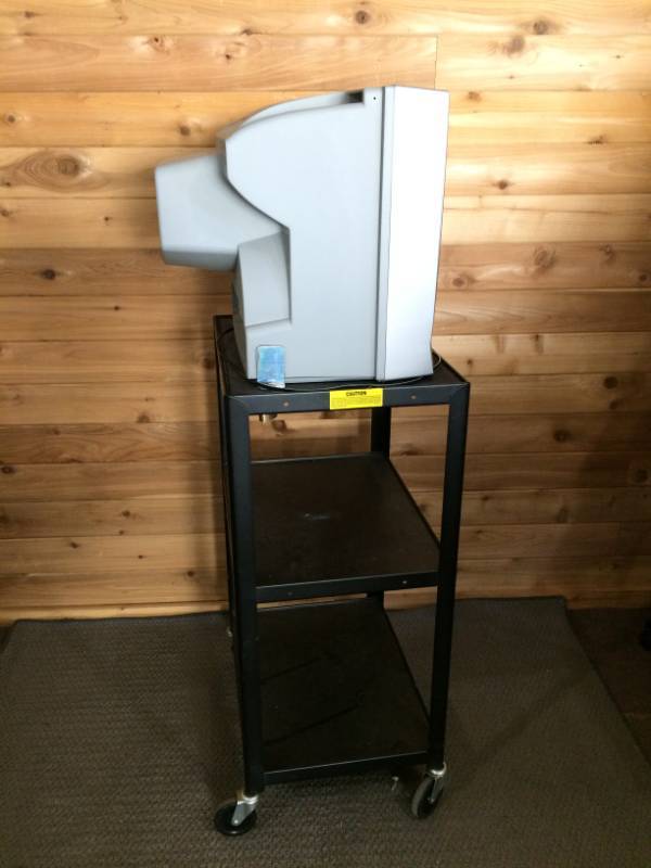 lot 15 image: Magnavox 20MC430417 TV DVD VHS COMBO  20 wBretford utility cart