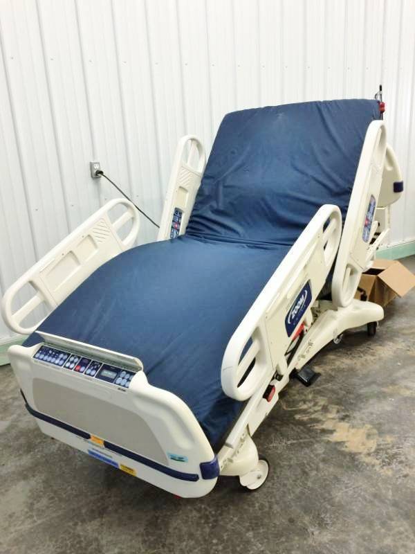 lot 77 image: GIVE YOUR LOVED ONE THE BEST Stryker Secure II WITH ZOOM Power Motorized Adjustable 500lb Capacity Hospital In-Home Health Patient Care Bed Built In Weight Scale & Bed-Exit Alarm Plugs Into Regular Light Socket Free Used High Quality Mattress
