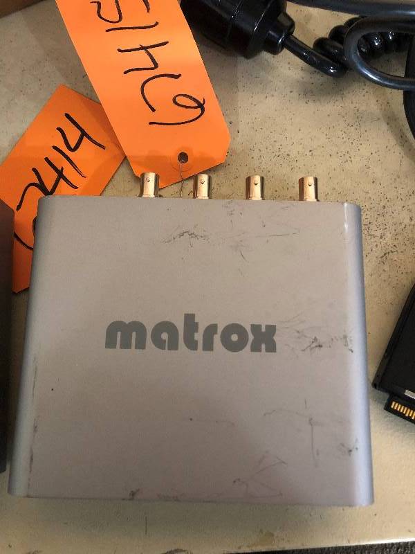 lot 22 image: Great Lot Two Matrox MXO External HD and SD Video Output for Mac, Microscope Lens (great for various projects like kaleidoscopes) Arthrex Wand Tool Pictured