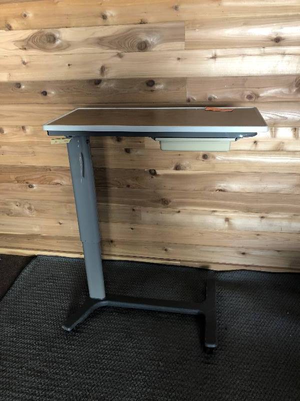 lot 34 image: Adjustable Overbed Table with storage drawer and mirror