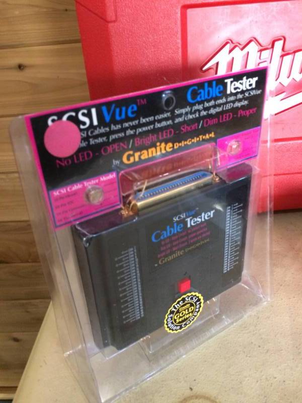 lot 50 image: Grandstream GS-HT701 Analog Telephone Adaptor , SCSI VUE Granite Digital Cable Tester, Empty Milwaukee Case - Some New In Package - See Pics