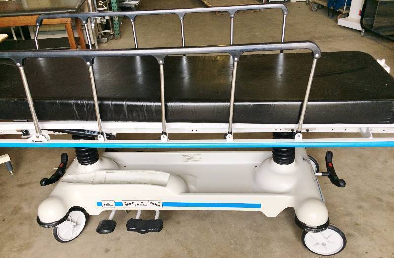 lot 33 image: Retails New $6000 - Super Nice Stryker 721 Bariatric 500lb Capacity Patient Transport Transfer Bed HiLow Tilt Forward & Back Gurney Stretcher EMS OR Hospital Emergency Ambulance Mobile Easy Steer Multi-adjustable Rolling - Comes With Free Pad