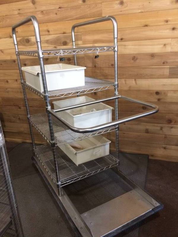 lot 58 image: MSRP $2000&nbspMetro Super Erecta Stainless Steel 4 Shelf  Mobile Wire Storage Shelving Unit Transport Cart - Drawers Not Included