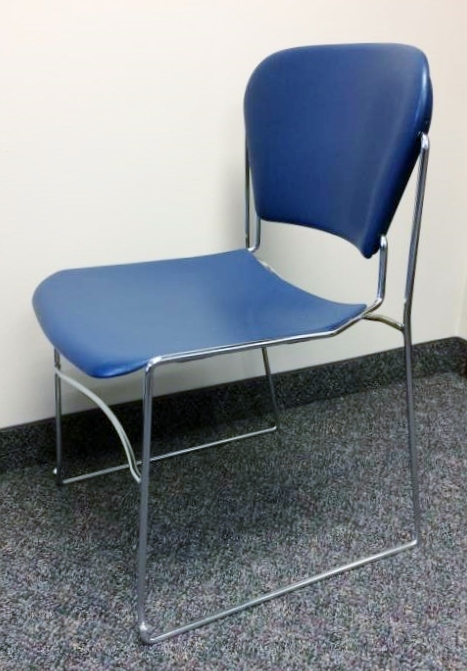 lot 7 image: MSRP $250 Each KI Perry High Density Armless Stack Stacking Blue Chrome Chair, 18 Inch Seat - Like New Condition See the YouTube for more information about this designer chair