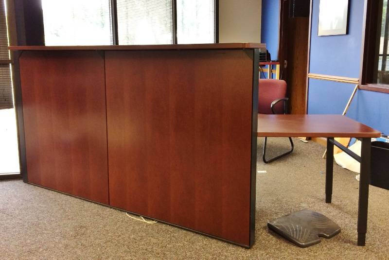 lot 18 image: High Quality Haworth Cherry Veneer Reception Desk - Measurements To Come - Great Condition - Left Side 3 Drawer Black Metal Filing Cabinet Included