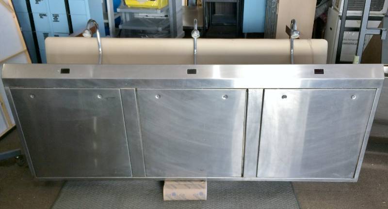 lot 12 image: MSRP $12,000&nbspSloan ESS-2300-C Optima Scrub Sink, Triple Station, Sensor Activated Faucet, Stainless Steel, with Laminar Flow Spray Head - Was Recently Removed From A Working Environment
