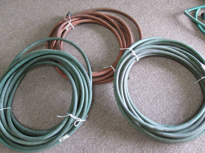 lot 32 image: 3 garden hoses, see pictures for le...