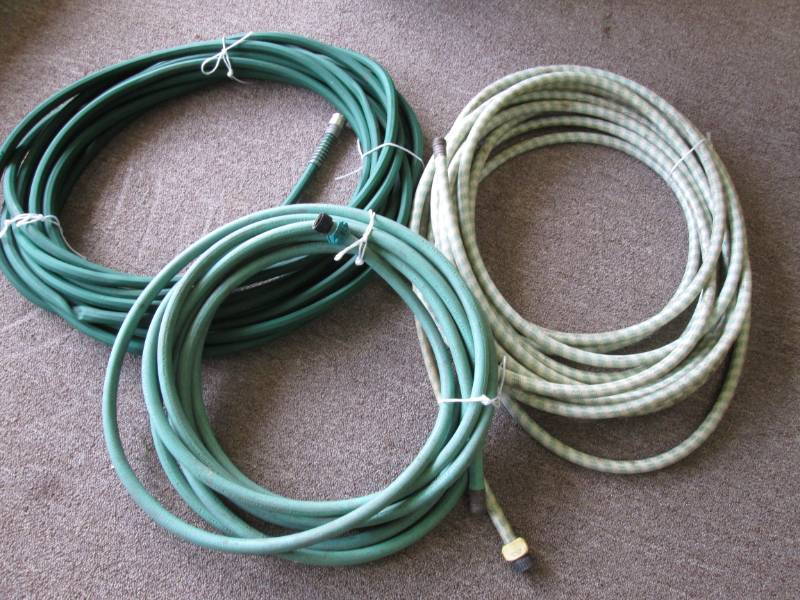 lot 33 image: 3 garden hoses, see pictures for le...