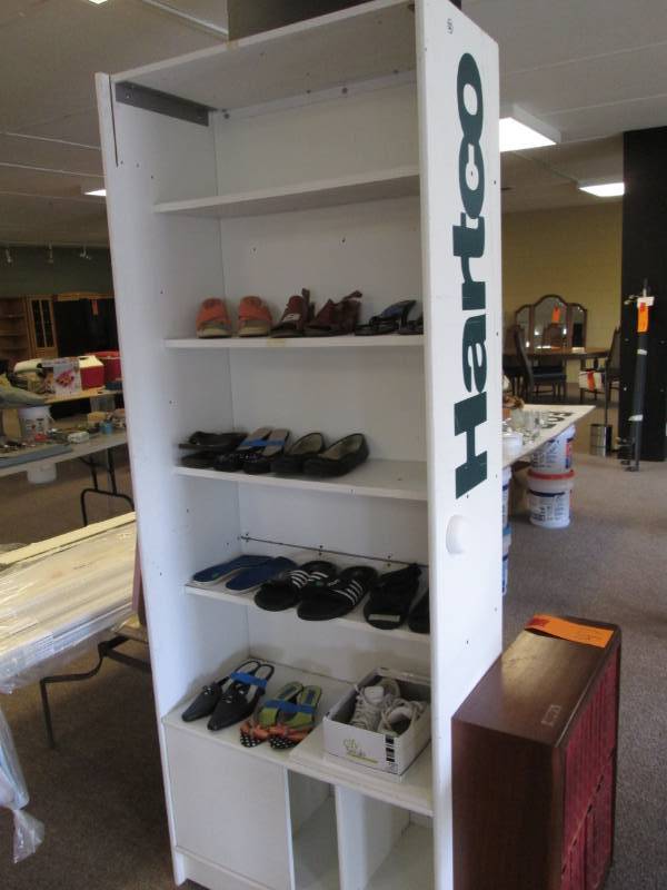 lot 49 image: Shelf full of shoes, shelf is 32 w...