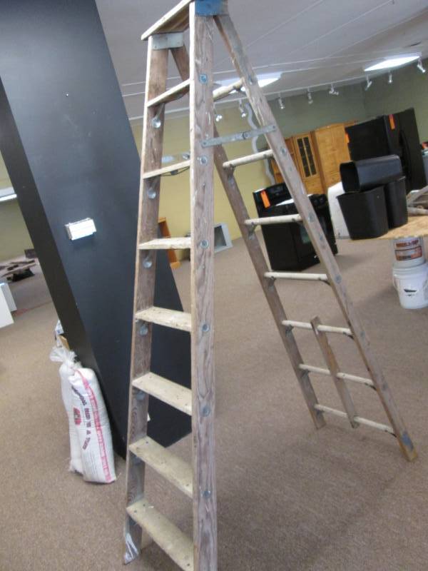 lot 63 image: 8 folding wood ladder...