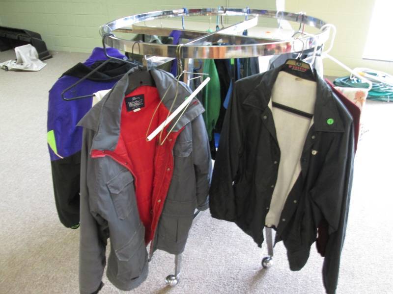 lot 64 image: Clothes rack full of clothes...