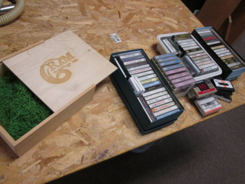 lot 66 image: Lot of cassette tapes and a wood bo...