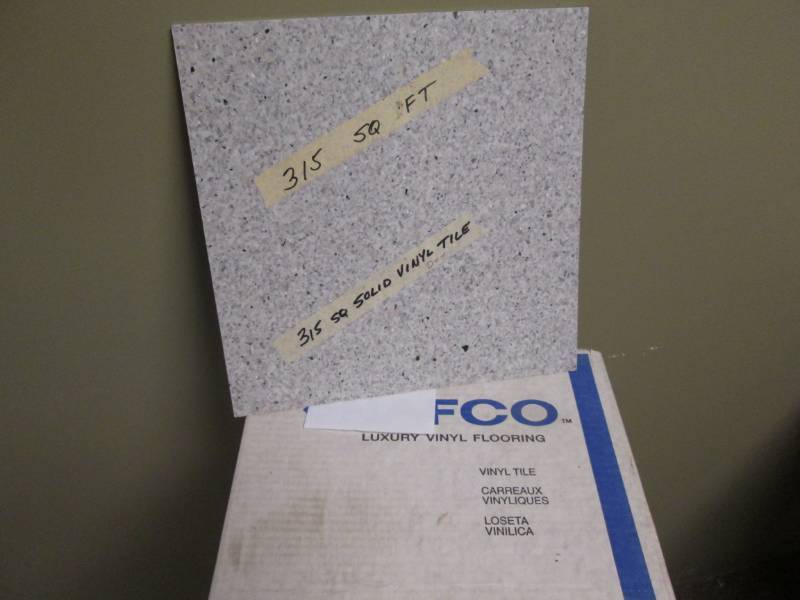 lot 105 image: 315 SF of floor tile, tiles all mat...