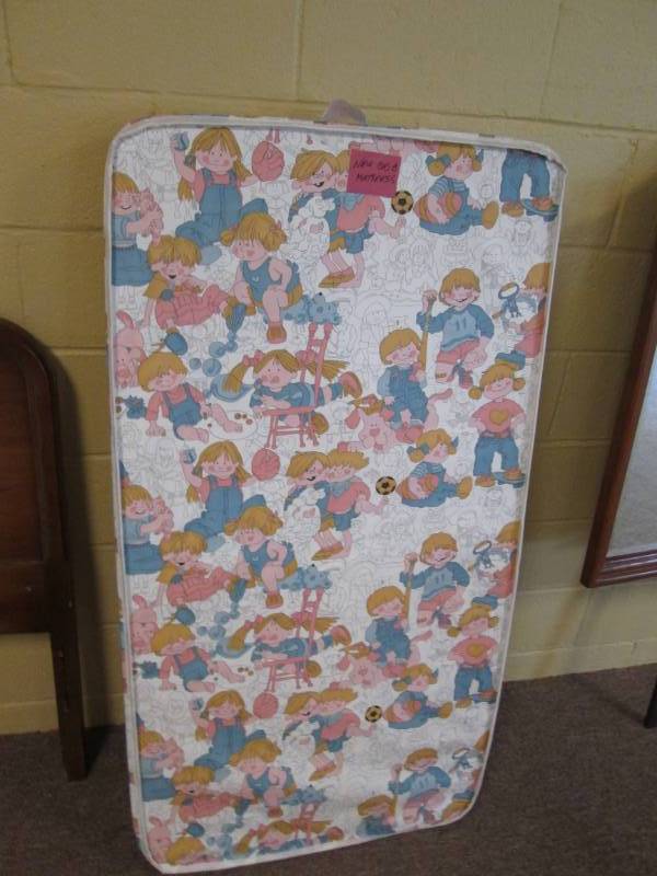 lot 111 image: Colorful crib mattress...