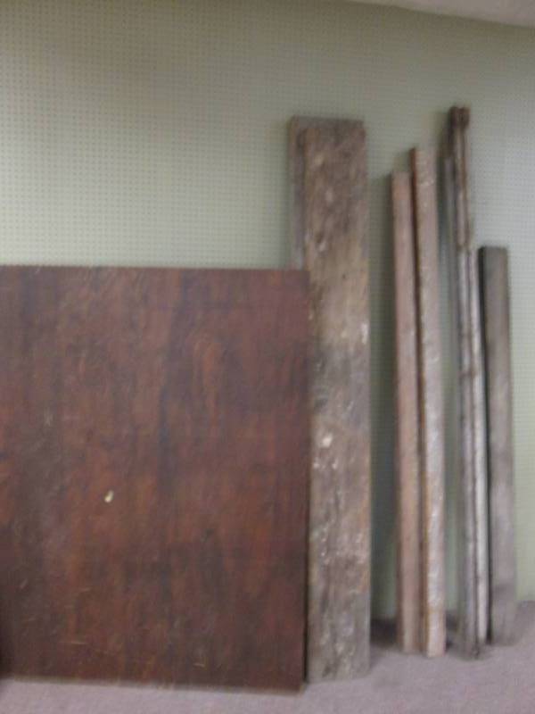 lot 116 image: 2 sheets of plywood and weatherd ba...