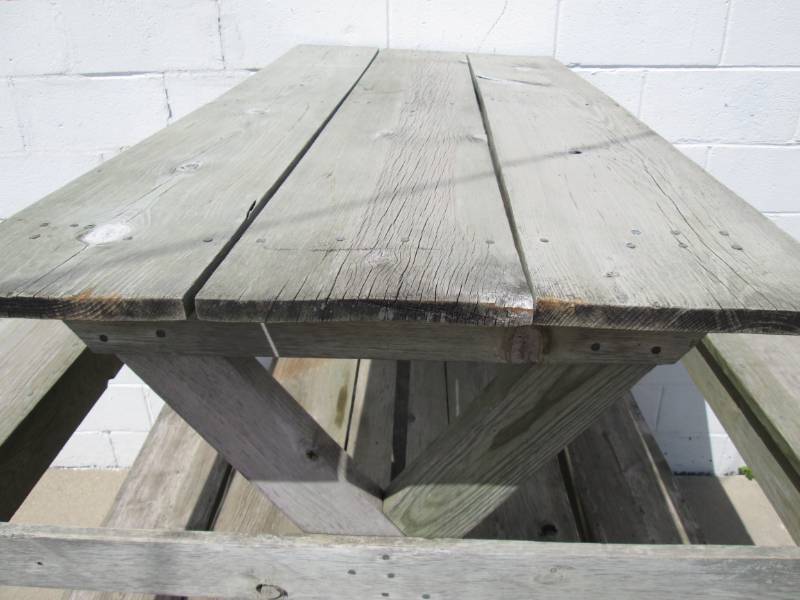 lot 132 image: Picnic table made of treated lumber...
