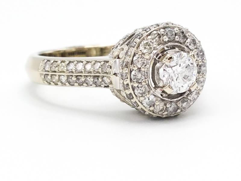 lot 3 image: Lustrous Round .82 Carat Diamond Halo Diamond Ring in 14k White Gold