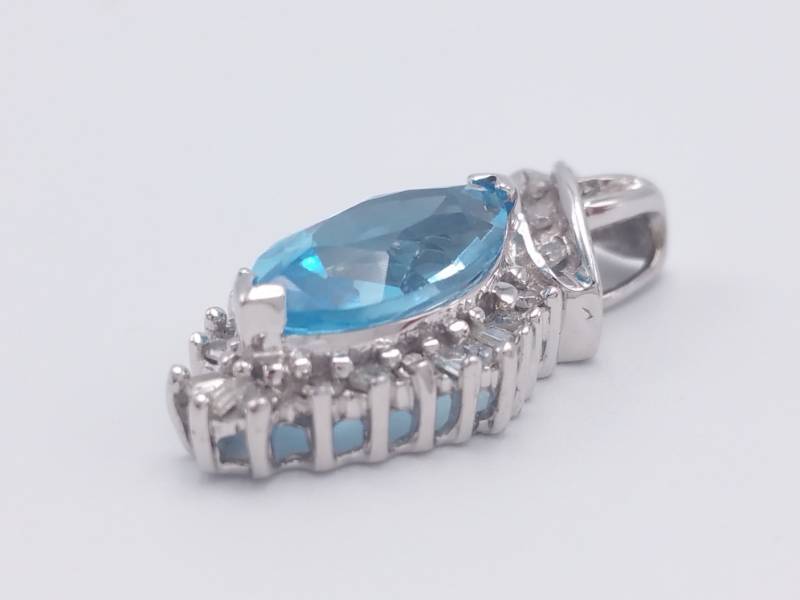 lot 60 image: Vibrant Blue Topaz and Diamond Estate Pendant in 10k White Gold