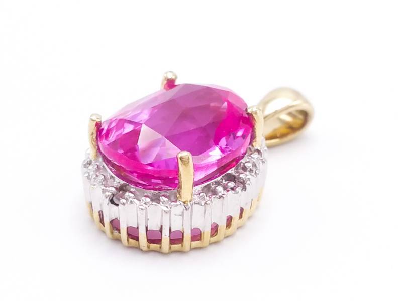 lot 66 image: Luscious Large Pink Sapphire and Diamond Pendant in 10k Two-Tone Gold
