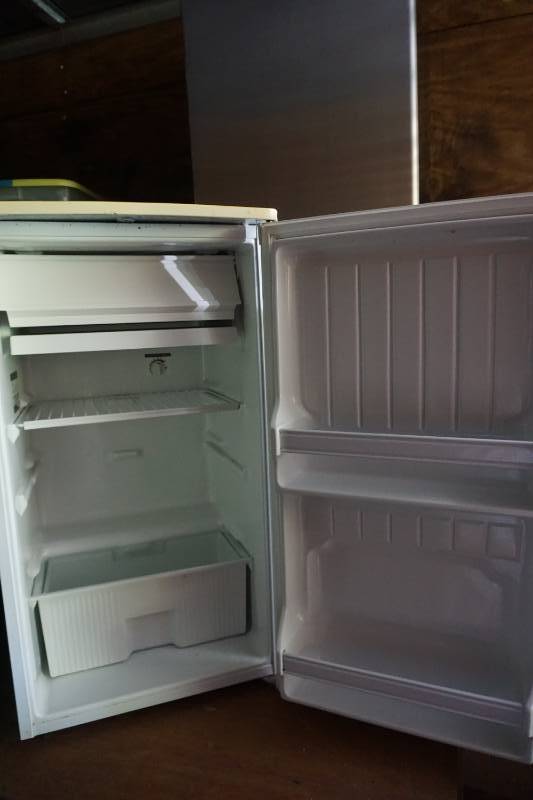 lot 22 image: GE Model TAX4SNYBWH 4.4 Cubic Foot Refrigerator