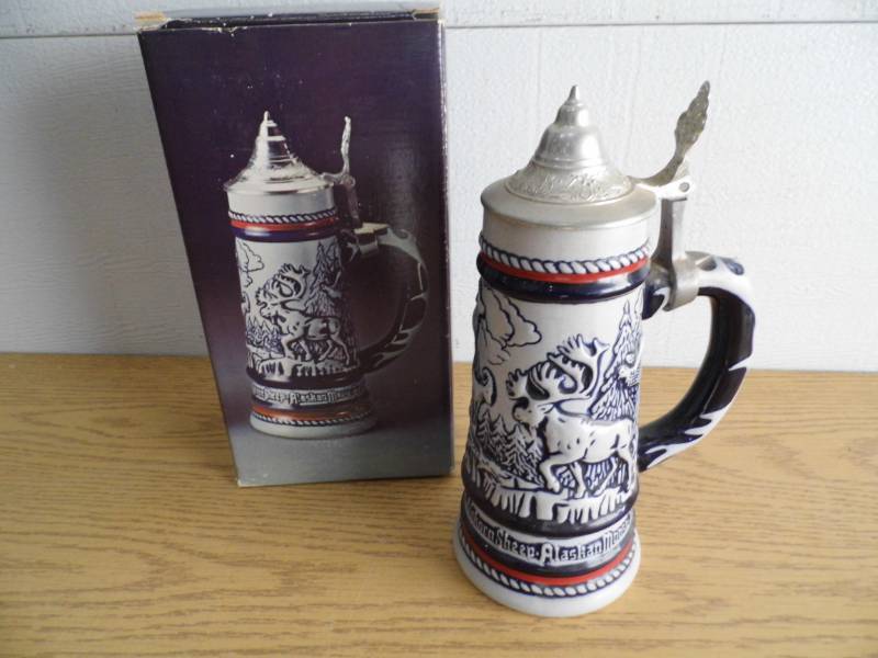 lot 12 image: Avon Collector Stein
