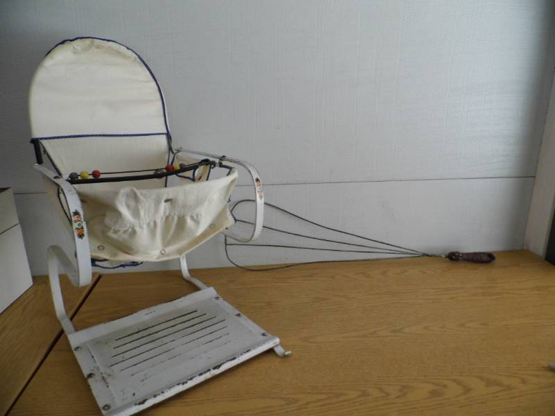 lot 33 image: Rug Beater - Antique Baby Bouncer