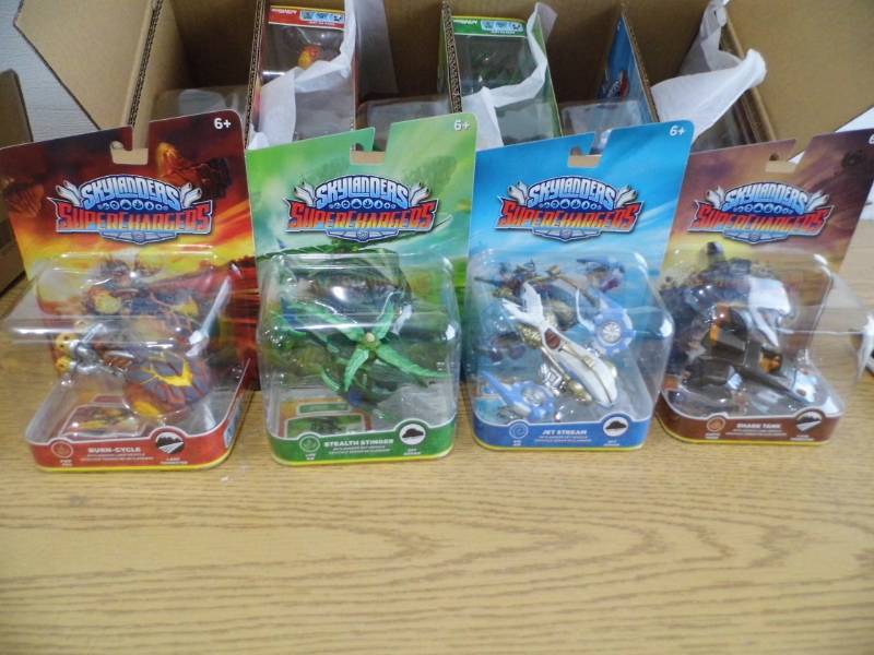 lot 75 image: Case of 12 Skylander Action Figures