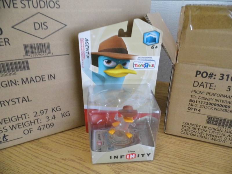lot 80 image: Case of 24 Disney Agent P Figures