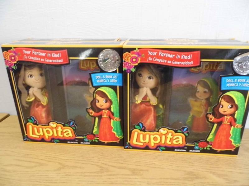 lot 87 image: Lot of 4 Lupita Dolls