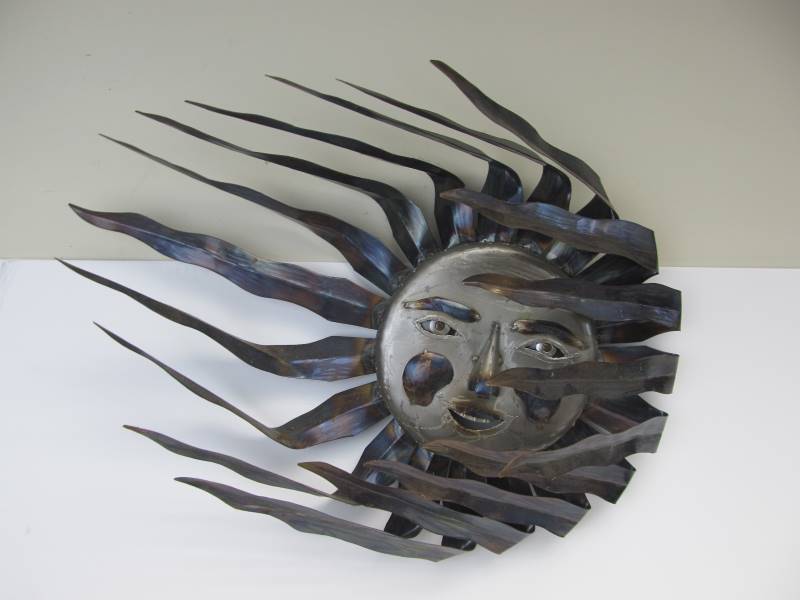 lot 106 image: Large Metal Wind-Blown Sun Face Wall Sculpture