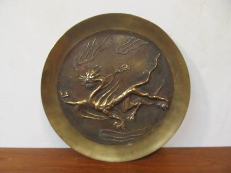 lot 190 image: Vintage Oriental Relief Brass Sculptural Dragon Plate