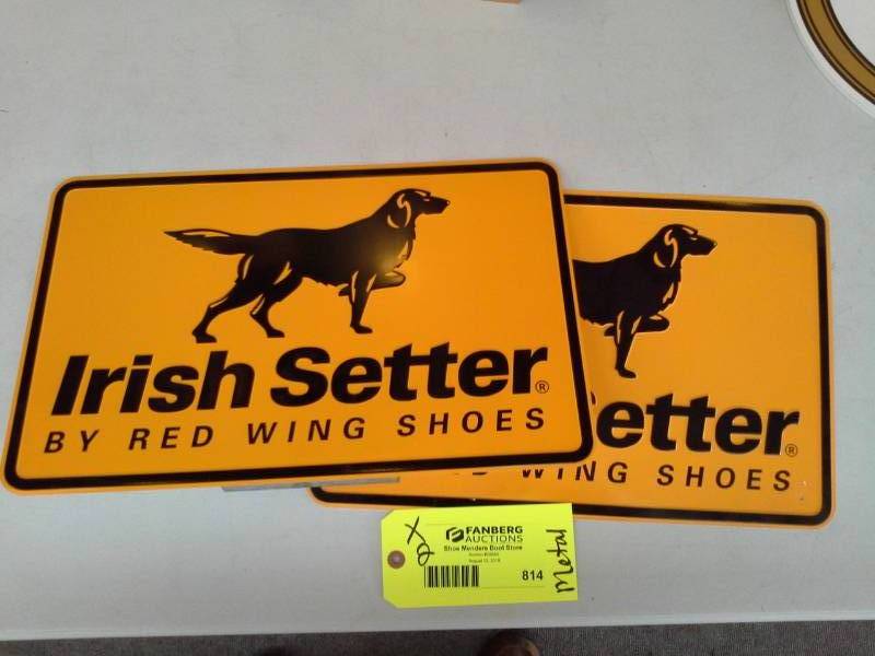 lot 814 image: Lot of (2) Irish Setter by Red Wing Shoes Metal Wall Sign