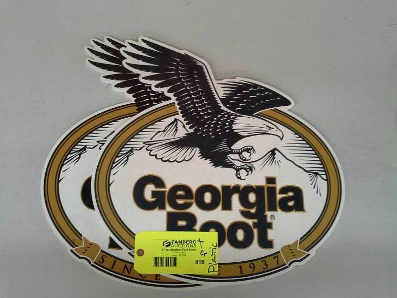lot 816 image: Pair of Georgia Boot Plastic Wall Signs