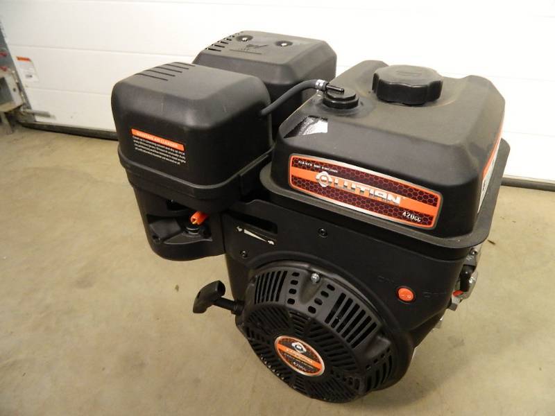 lot 9 image: Brand New 15 HP Engine