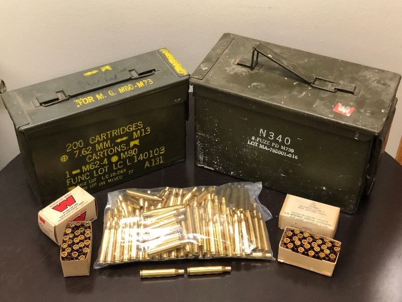 lot 22 image: Lot Of       (2) Steel Ammo Cans       (111) Spent 25-06 Rifle Brass       (2) 50-Count Boxes Od Unprimed .22-Hornet Brass