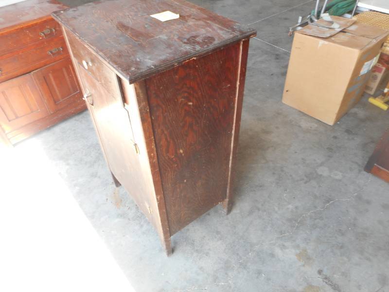 lot 49 image: Taller Wood Cabinet