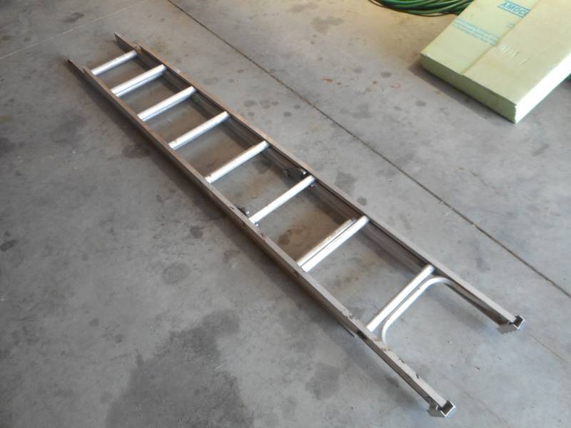 lot 18 image: Two Aluminum Extension Ladders