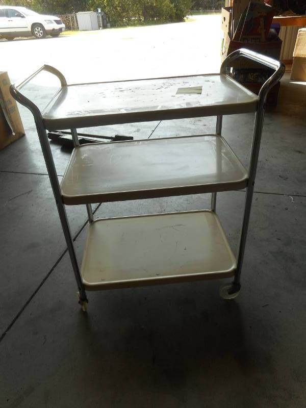 lot 52 image: Used White Metal Rolling Cart