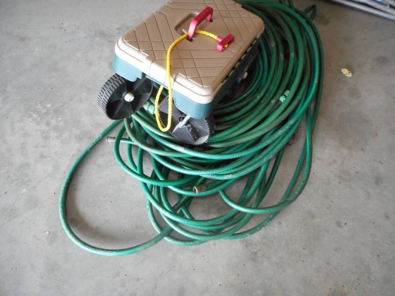 lot 46 image: Three Garden Hoses  Rolling Garden SeatContainer