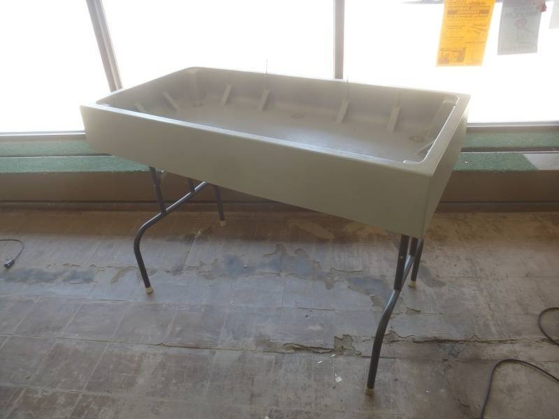lot 154 image: Plastic Display Table