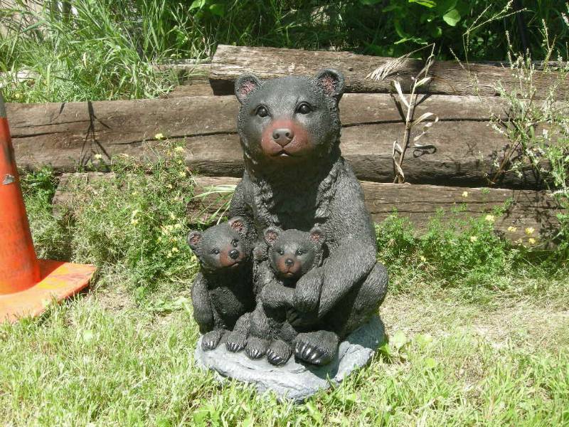 lot 32 image: Black Bear Holding Cubs Figure